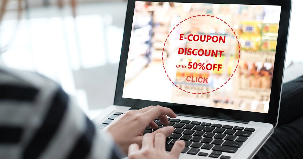 Woman,Entering,The,Discount,Coupon,Code,On,Laptop,Computer,To